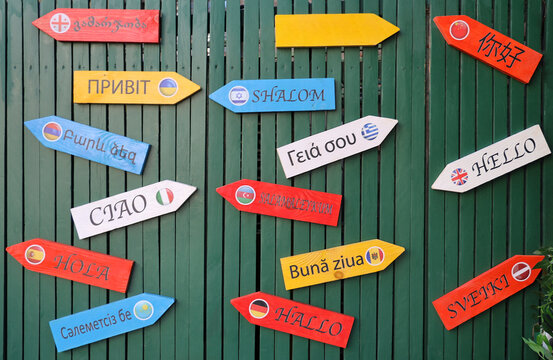 Hello in different languages words in colorful painted arrows TBILISI international city old town, GEORGIA