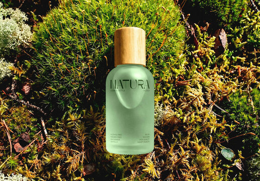 Frosted Cosmetic Bottle Mockup in Moss