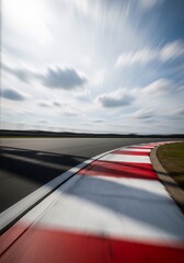 Fototapeta premium Racing circuit blurred intensely in pursuit and speed