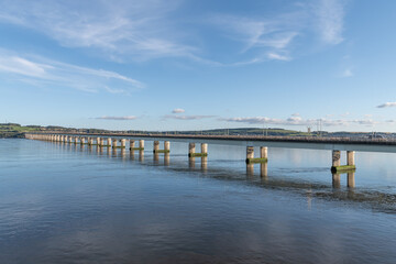 Obraz premium The Tay Road bridge reflected in the River Tay, Dundee, Angus, Scotland