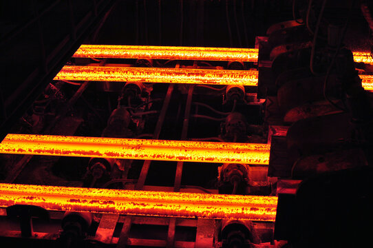 Production of iron in a steel mill - red-hot metal in an industrial plant