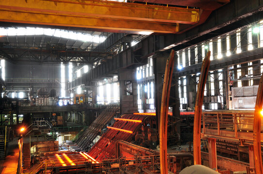 Production of iron in a steel mill - red-hot metal in an industrial plant