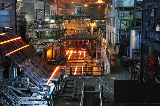 Production of iron in a steel mill - red-hot metal in an industrial plant