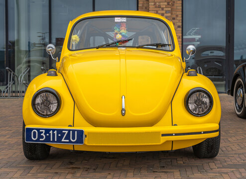 Scheveningen, The Netherlands, 25.05.2025, Yellow Volkswagen Beetle, informally VW Bug, Iconic Retro Car at The Aircooled classic car show