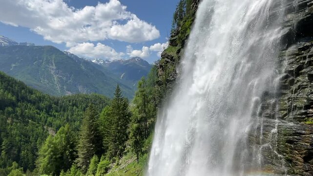 Stuibenfall waterfall bigest waterfall in Tirol in the Otztal valley in Tyrol Austria during a beautiful springtime day in the Alps. Vertical video.