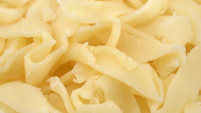 Beer snack made of dried squid. Dried squid isolated on white background. Dried squid shavings. Small fish, shrimp and squid that have been marinated with salt and dried