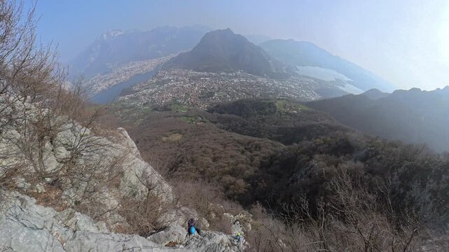 Via Ferrata Corno Rat, Valmadrera, Lecco, Lombardia - 22 climbers ascend the via ferrata on vertical walls with sweeping views of the city