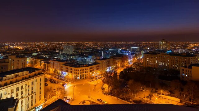 Rooftop overlooking central Baku with cityscape at sunset, modern buildings and streets featuring urban landscape, architecture, city with timelapse