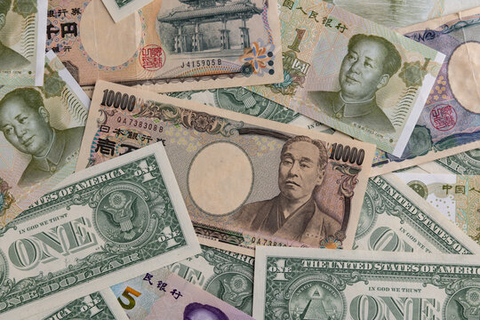 Multicurrency Collage Featuring Japanese Yen, US Dollars, and Chinese Yuan