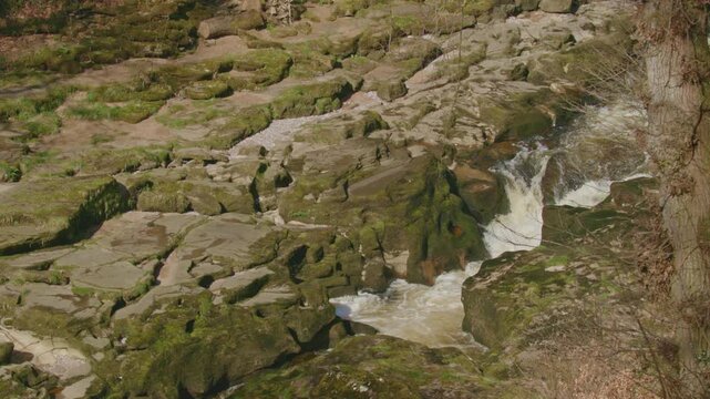 elevated zoomed in shot of the strip,bolton abbey, Yorkshire dales, uk in slow motion, 100fps, 4k