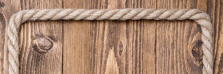 Website banner rustic wooden plank background with rope frame copy space header © hannamartysheva