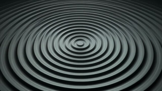 A close-up view of concentric circular patterns forming a spiral on a flat surface