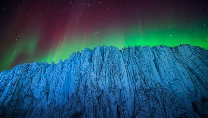 Displaying tall blue ice cliff sculpted with crevasses in polar night with aurora and stars