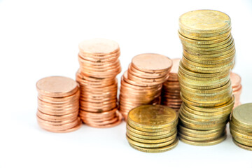 Close up of coins to stack of coins.