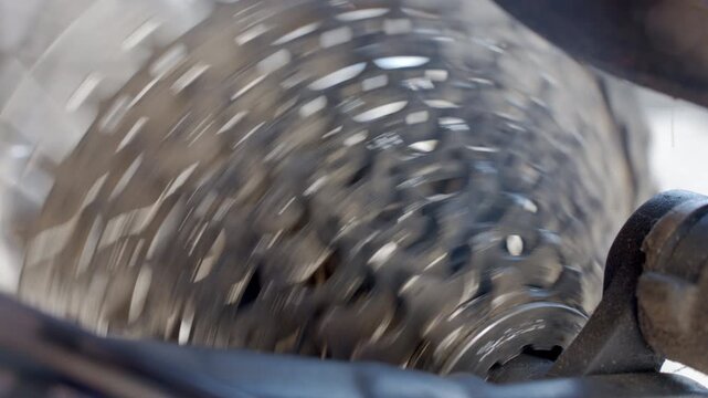 Close up of bicycle rear cassette and chain. Bike drivetrain components. Bike maintenance and repair service concept