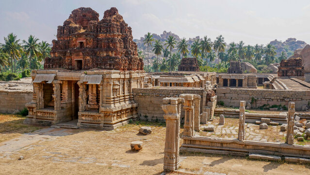 Ancient 14th century ruins of Hampi in Karnataka, India. Part of an extensive area protected as a UNESCO heritage site, filled with old structures of temples and palaces.