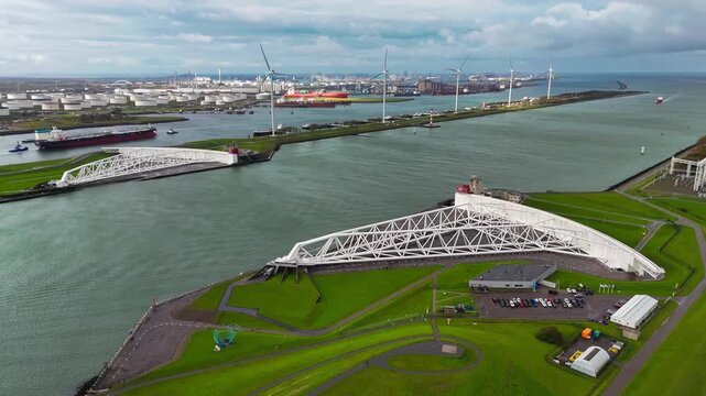 The Maeslantkering, or Maeslant barrier, is a storm barrier in the Rhine Delta in the Netherlands for flood protection. It is one of the largest moving structures on Earth. High quality 4k footage
