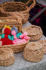 Obraz premium Vibrant handmade crafts on display at a local market showcase cultural artistry and creativity