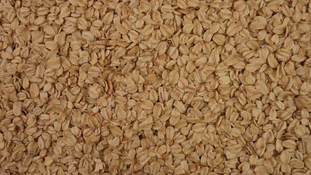 Dry oat flakes, Rolled oats background top view.