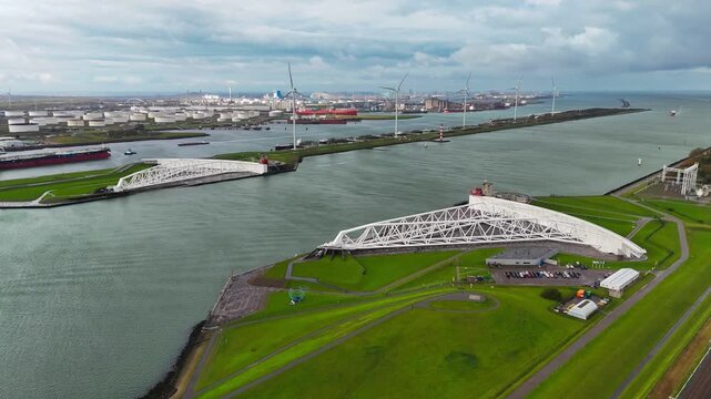 The Maeslantkering, or Maeslant barrier, is a storm barrier in the Rhine Delta in the Netherlands for flood protection. It is one of the largest moving structures on Earth. High quality 4k footage