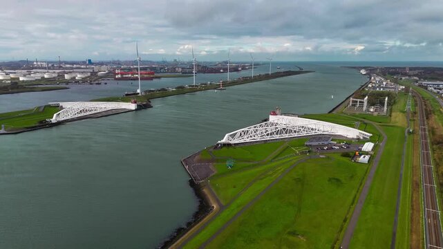The Maeslantkering, or Maeslant barrier, is a storm barrier in the Rhine Delta in the Netherlands for flood protection. It is one of the largest moving structures on Earth. High quality 4k footage