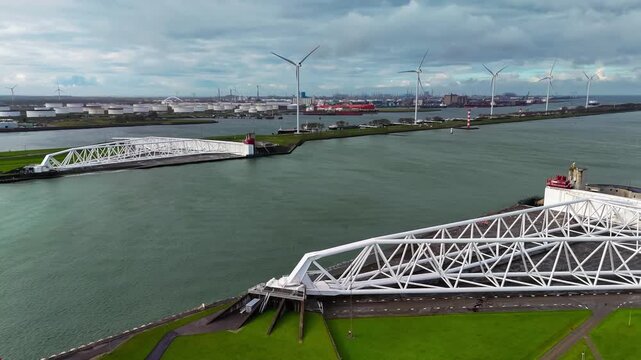 The Maeslantkering, or Maeslant barrier, is a storm barrier in the Rhine Delta in the Netherlands for flood protection. It is one of the largest moving structures on Earth. High quality 4k footage