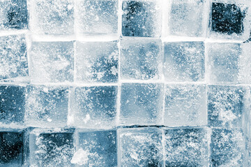mosaic tile ice cubes on a dark blue background.