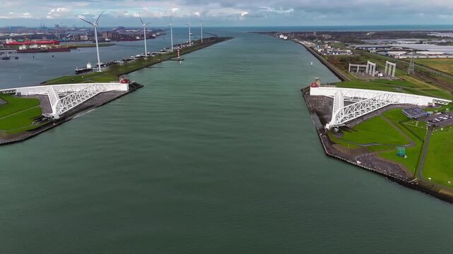 The Maeslantkering, or Maeslant barrier, is a storm barrier in the Rhine Delta in the Netherlands for flood protection. It is one of the largest moving structures on Earth. High quality 4k footage