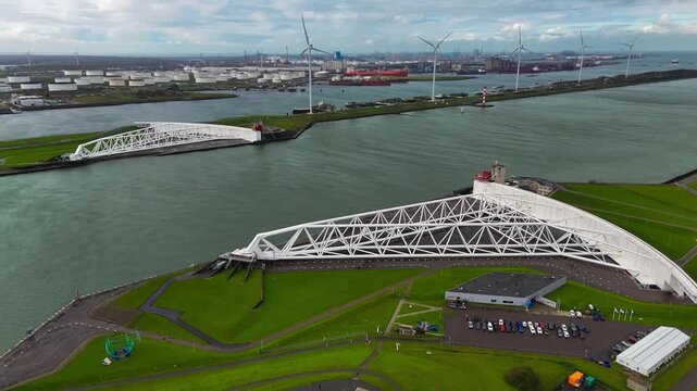 The Maeslantkering, or Maeslant barrier, is a storm barrier in the Rhine Delta in the Netherlands for flood protection. It is one of the largest moving structures on Earth. High quality 4k footage