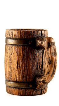 Wooden beer mug with handle.