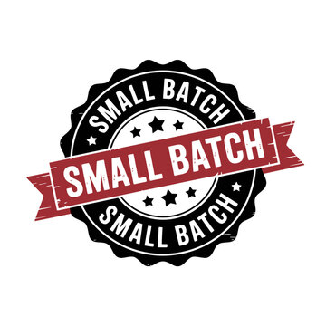 Small batch label with red banner and white text on black circle