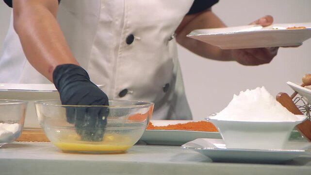 Confident professional chef wearing traditional white toque and jacket