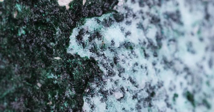 Malachite and Quartz on Chrysocolla. Specimen from Tenke Fungurume, DR Congo. macro footage detail texture background. close-up mineral crystal unpolished semi-precious gemstone