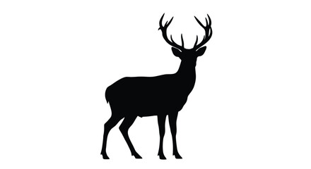 Majestic stag with large antlers stands proudly a dark silhouette © momotaj