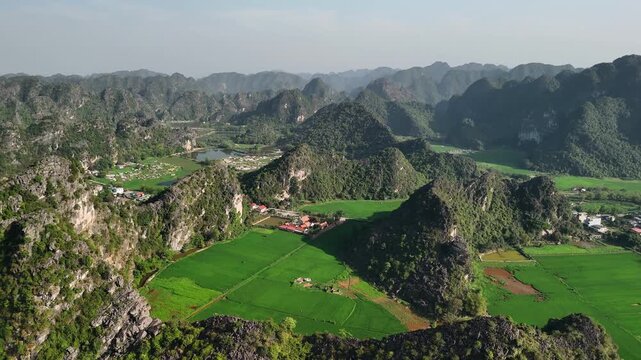 Aerial view of ninh binh mountains and hoa lu ancient capital rice paddies in vietnam