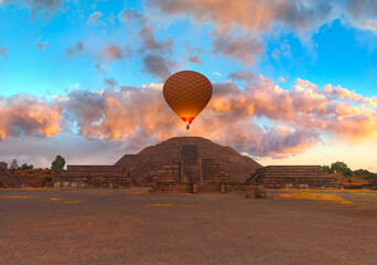 Hot air balloon flying over Teotihuacan pyramids complex located in Mexican Highlands and Mexico Valley close to Mexico City. Mexico