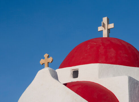 Orthodox Church with a red dome on the island of Mykonos in Greece