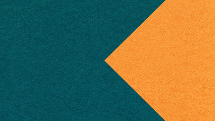 Textured dark teal paper background with orange arrow, macro. Template with copy space for banner, presentation © nikol85