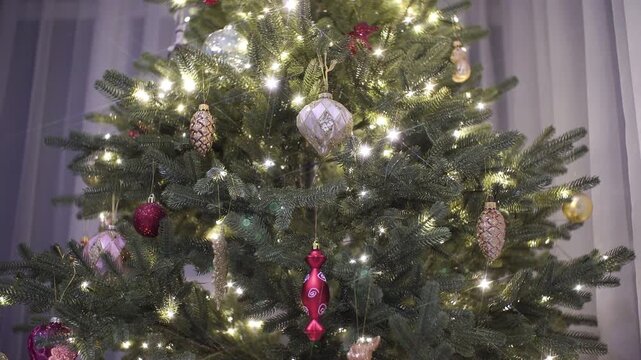 The Magical Light Of Festive Lights Against The Backdrop Of A Decorated Chri