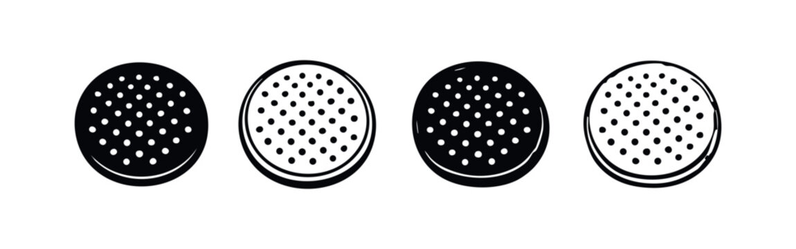 Black and white cookie icons set, resembling sandwich cookies like Oreos, with dotted texture from a top view.