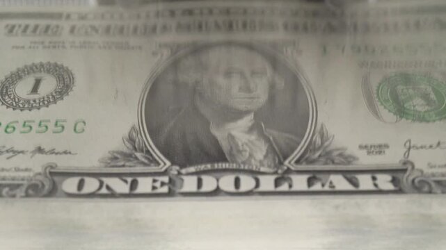 Machine For Counting And Checking The Authenticity Of Dollar Bills.