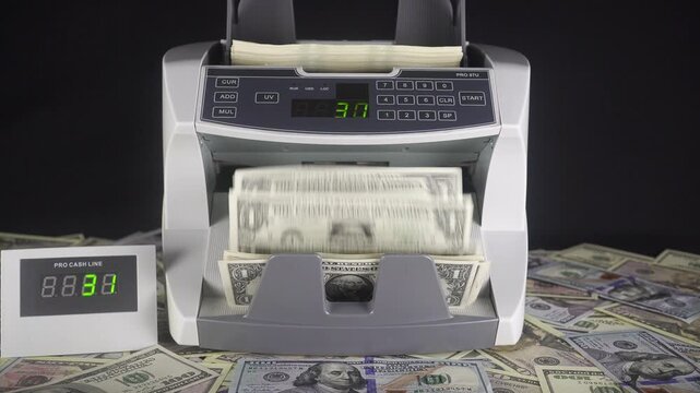 Machine For Counting And Checking The Authenticity Of Dollar Bills.