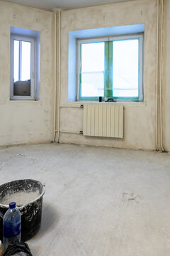 view of concrete room with rough finishing