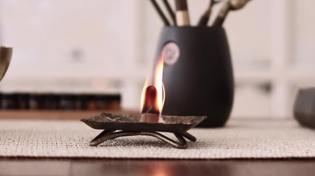 Ritual flame. Spiritual practice. Tools for meditation yoga activity mental health smoke fire destress oriental calming atmosphere.