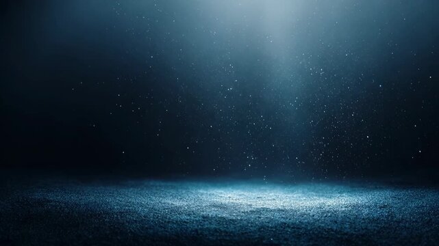 Spotlight dark background with dust particle illuminated floor, dramatic lighting and moody atmosphere, ethereal effect, mysterious underwater scene, blue light rays, glowing particles, abstract