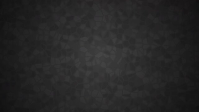 Abstract animated background featuring irregular crystal-like facets forming a dark polygonal mosaic surface.