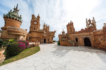 Castillo de Colomares in Benalmadena shows ornate towers, Moorish arches, and Gothic spires under...