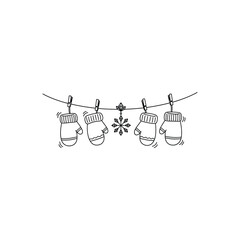 Four mittens hanging on a clothesline with snowflake.