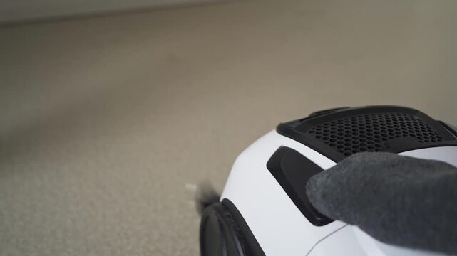 Retracting power cord of vacuum cleaner close up