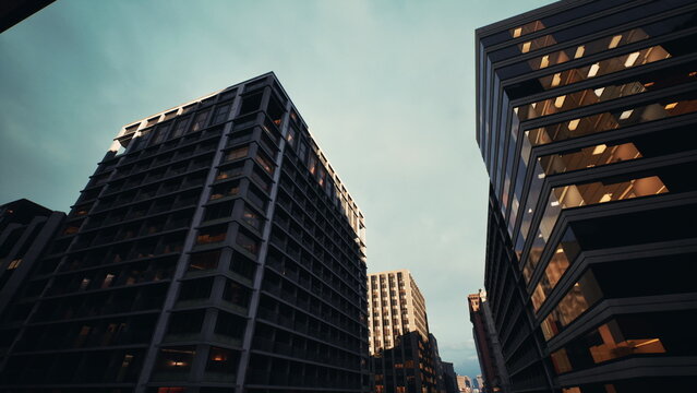 Low angle city skyscrapers at dusk with warm lit windows and narrow urban canyon, towering concrete and glass facades, deep shadows, cinematic tealorange